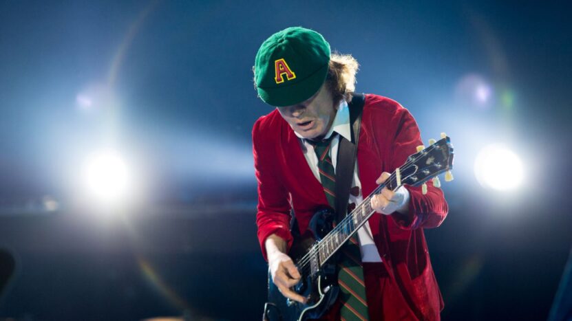 AC/DC: Why Angus Young Wears a School Boy Outfit